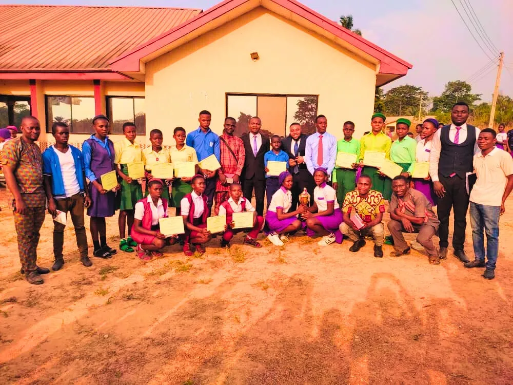 Students, teachers and guests with certificates outside the event venue