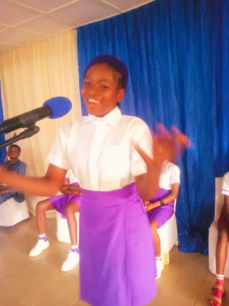 A student gestures as she speaks at the 2023 IT Debate