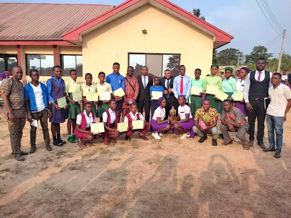 Students, teachers and guests with certificates outside the venue
