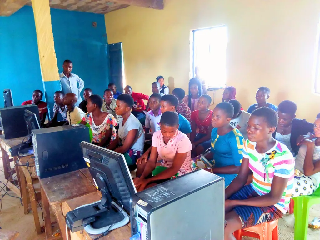 Young people at desktop computers during a training session