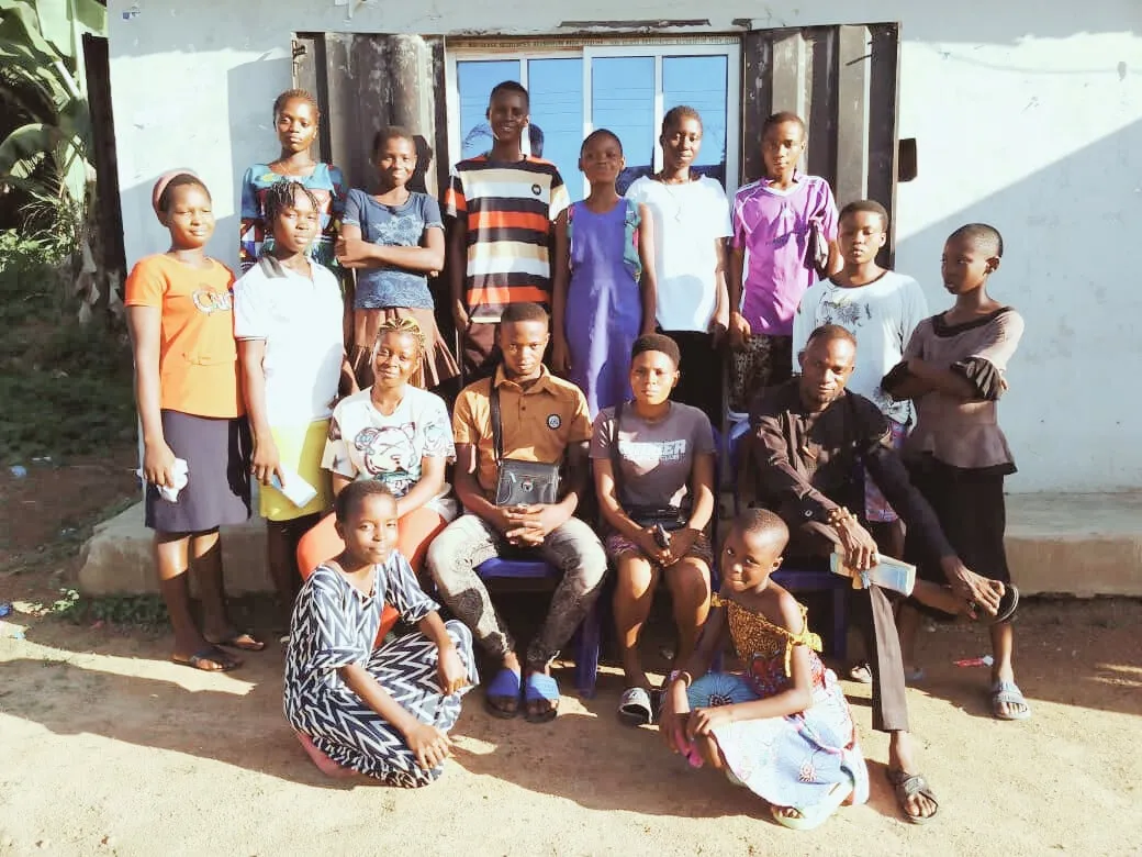 Students and trainers gathered outside after a session