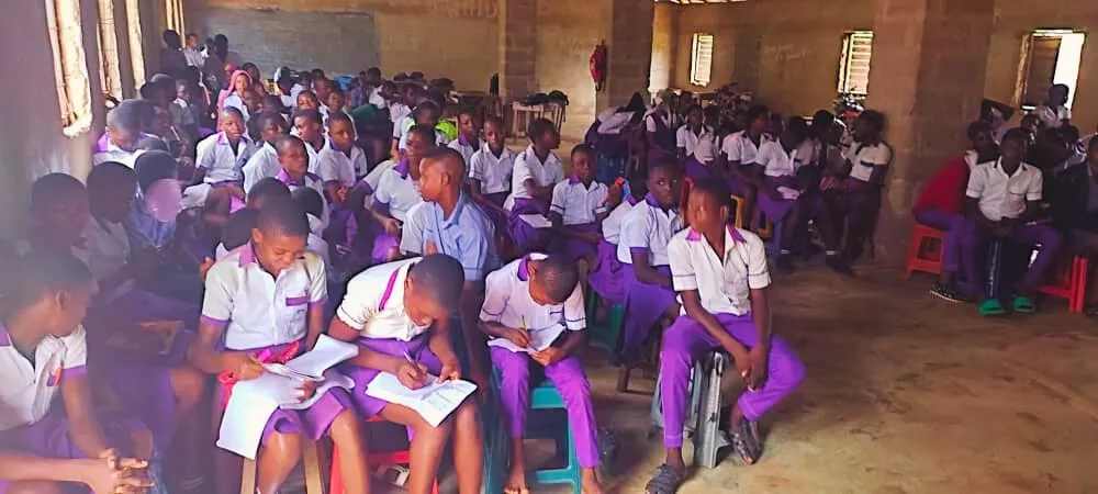 A packed school hall during an awareness talk