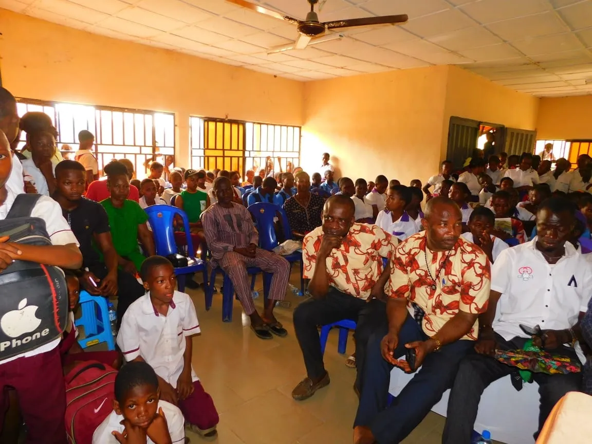 Parents, teachers and students fill the hall to watch the IT Debate