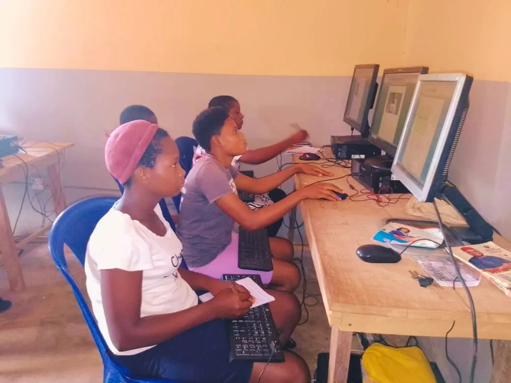 A student concentrates at a computer during exam practice